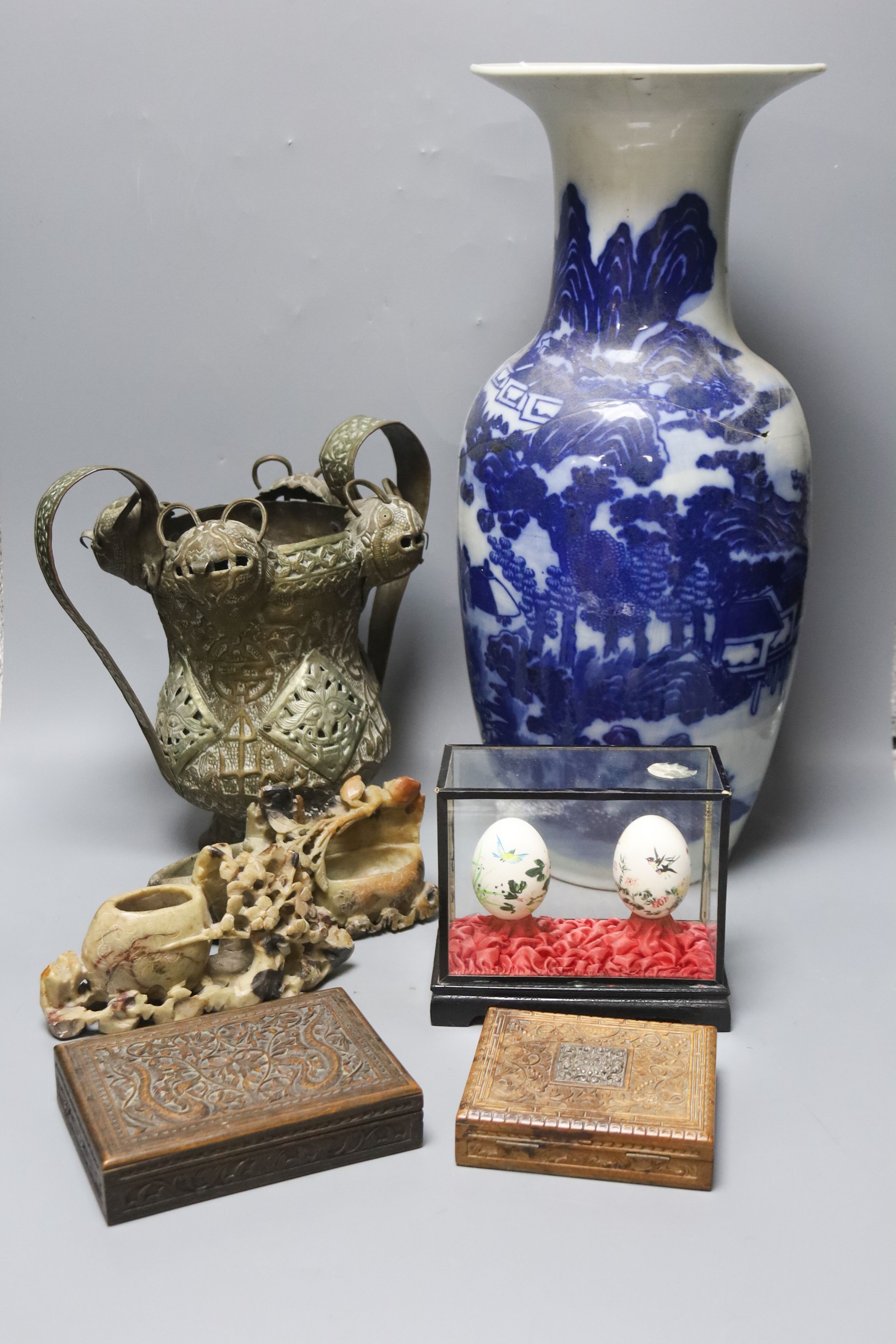 A large Chinese vase, a.f., 47cm, a pair of soapstone carvings, embossed Chinese brass ornament and cased pair of painted eggs